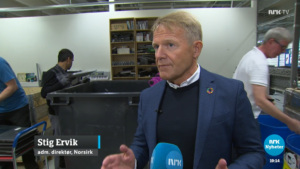 Stig Ervik intervjues av NRK hos OPT om mobilgjenbruk